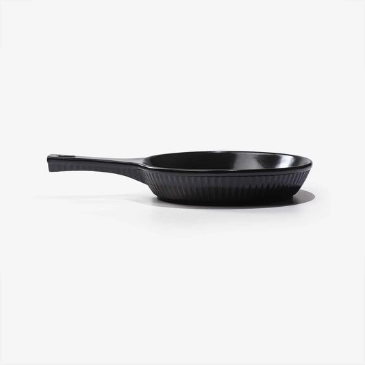 A professional black Xtrema pure ceramic frying pan on a white background.