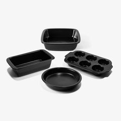 Set of four black Xtrema pure ceramic baking pans, including a muffin tin and loaf pan.