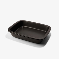 Professional Xtrema black ceramic rectangular baking dish on a white background.