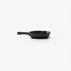Xtrema black pure ceramic skillet with a ribbed interior and ergonomic handle.