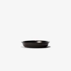 Xtrema matte black pure ceramic shallow pan on a white background