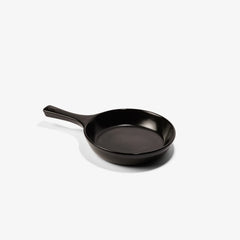 A sleek, black Xtrema pure ceramic frying pan isolated on a white background.