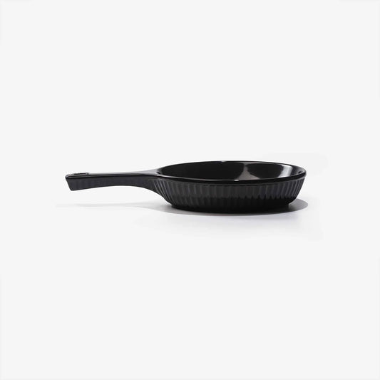 Xtrema black pure ceramic frying pan with a textured interior and long handle.