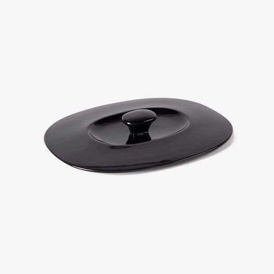 Professional black Xtrema pure ceramic lid with a central knob on a white background.