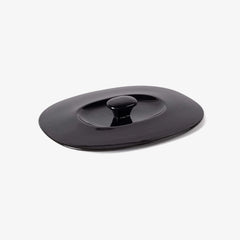 Professional black Xtrema pure ceramic lid with a central knob on a white background.