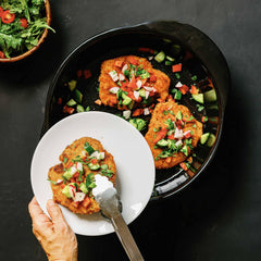 Gourmet patties with fresh salsa served in an Xtrema ceramic skillet.