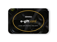 Xtrema e-gift card featuring black pure ceramic cookware on a dark background.
