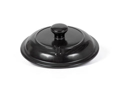 Xtrema black pure ceramic lid with a round knob and glossy finish.