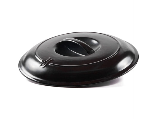 A professional black Xtrema pure ceramic cookware lid with a centered handle.